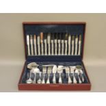 A ninety-two piece set of Viners canteen of cutlery, for eight place settings, and two napkin rings,