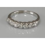 A 9ct white gold diamond set half eternity ring