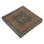 A late 19th century unusual Canton lacquer shawl box, the black ground gilt with a garden within a