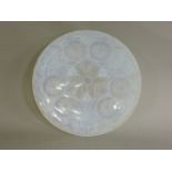 A French moulded glass charger, with a slight opalescent blue, 31.5cm diameter