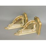 A pair of carved wood wall brackets, on harp supports, 32 x 19cm