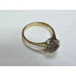 A 9ct gold ruby and diamond cluster ring