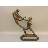 A re-cast bronzed figure group of ballerinas, 61cm