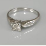 A 9ct white gold single stone illusion set diamond ring