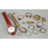 A ladies 9ct gold Pinnacle strap watch, a 9ct gold boat shaped ring, a gold twisted wire ring, a 9ct