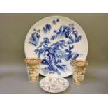 A large Japanese blue and white charger, with script on reverse, 46cm diameter, a famille rose