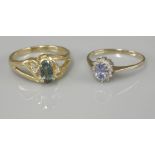 A 9ct gold sapphire and diamond oval cluster ring, and an 18ct gold tourmaline ring with diamond set