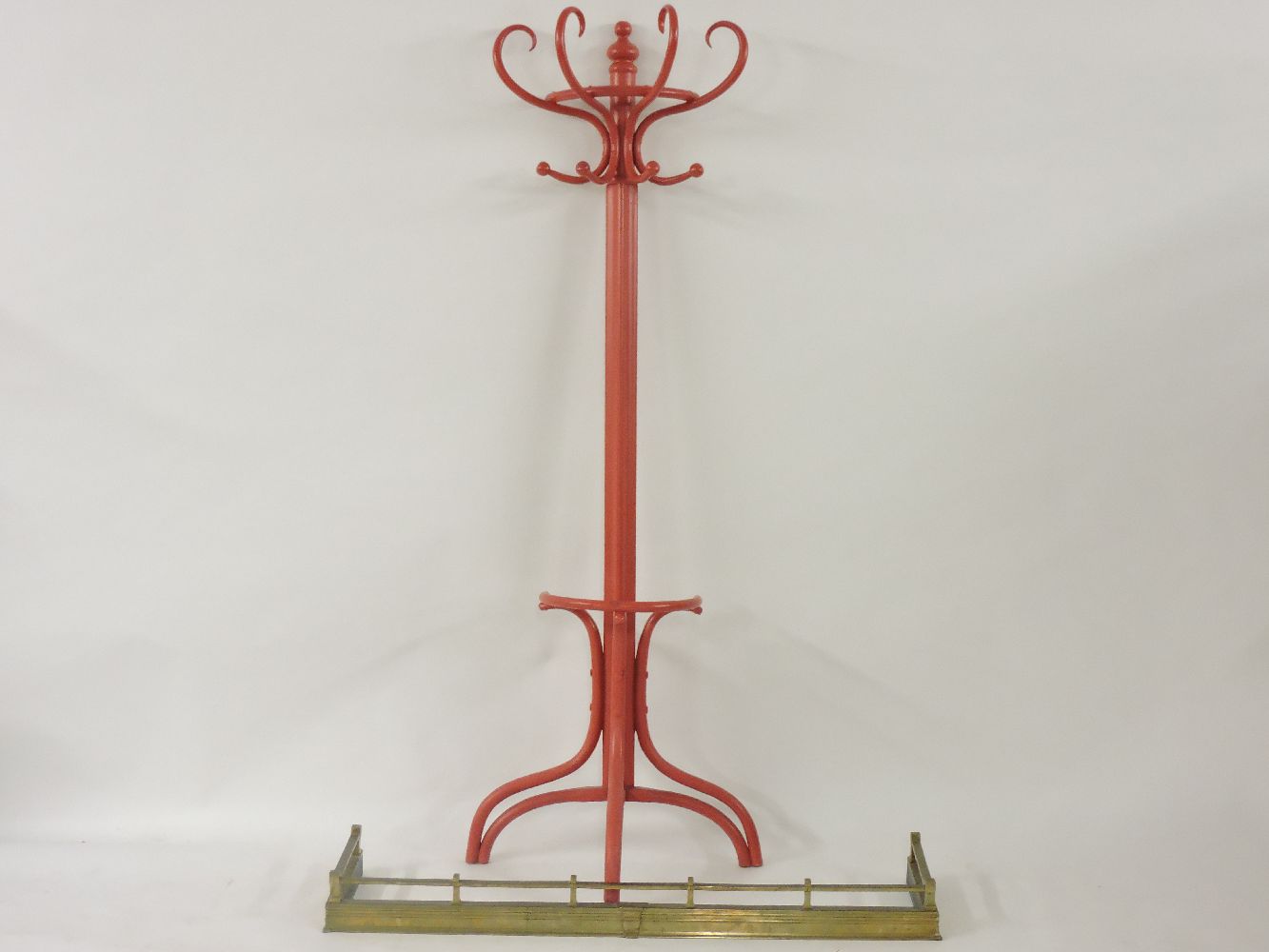 A painted bentwood hat stand/coat rack, and a fender