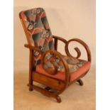 An Art Deco style open Armchair with adj