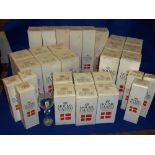 A large selection of boxed Holmegaard (h