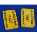 A pair of painted sycamore Games Markers with painted decoration and ivory pegs