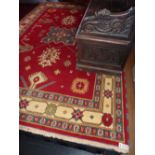 A red ground hand made Kazak Carpet, 2.9