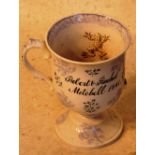 A mid 19th Century two handled blue transfer decorated Loving Cup (one handle now completely