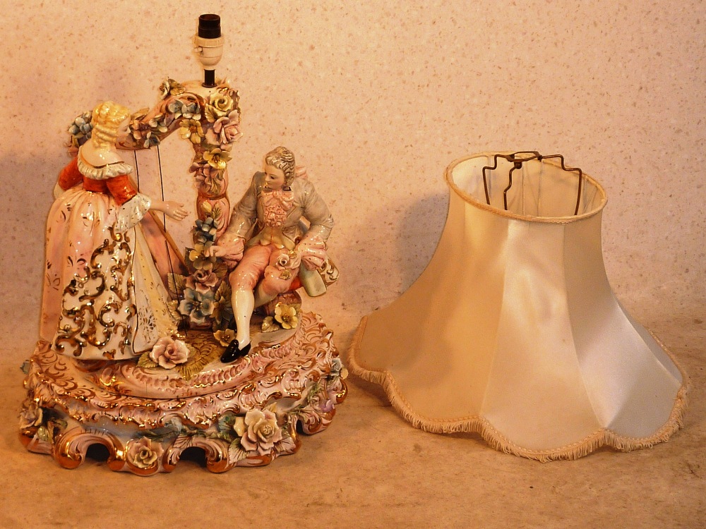 A large and extravagant mid 20th Century Italian ceramic Table Lamp modelled as a male and female