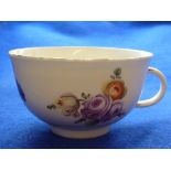 A small well potted Continental porcelain Cup raised on circular foot,