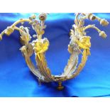 A late 19th/early 20th Century gilt metal six branch Chandelier,