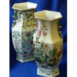 A matched pair of similar Chinese hexagonal baluster form Vases,