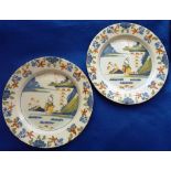 A pair of 18th Century small Delftware Plates each polychrome decorated with a single Chinaman