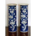 A pair of late 19th Century Chinese cylindrical porcelain Sleeve Vases hand decorated in underglaze