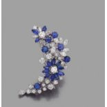 ANNeES 1960MAGNIFIQUE BROCHE FLEURETTESentièrement rehaussées de diamants taille brillant et