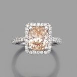 BAGUE DIAMANT FANCYElle est ornée d'un diamant coussin Fancy Brown-Orange dans un fin entourage de