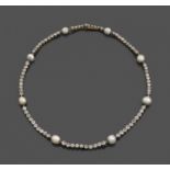 ANNEES 1900COLLIER PERLES FINESIl est constitué de 8 perles fines sur une ligne de diamants taille