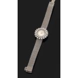 VACHERON & CONSTANTIN VERS 1970 Montre bracelet de dame en or gris. Boîtier rond dans un double