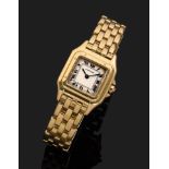 CARTIER PANTHÈRE PM Montre bracelet de dame en or jaune. Cadran argenté avec index chiffres