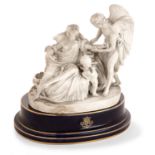 SÈVRES Groupe en biscuit de porcelaine dure, représentant l'Amour médecin, sur une base ovale à fond