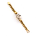 234 SOBIMO ANNEES 1950 MONTRE BRACELET DE DAME à boitier rond et attaches entièrement sertis de