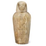 VASE CANOPE ET UN COUVERCLE Représentant la tête d'Amset (l'un des quatre fils d'Horus). La panse