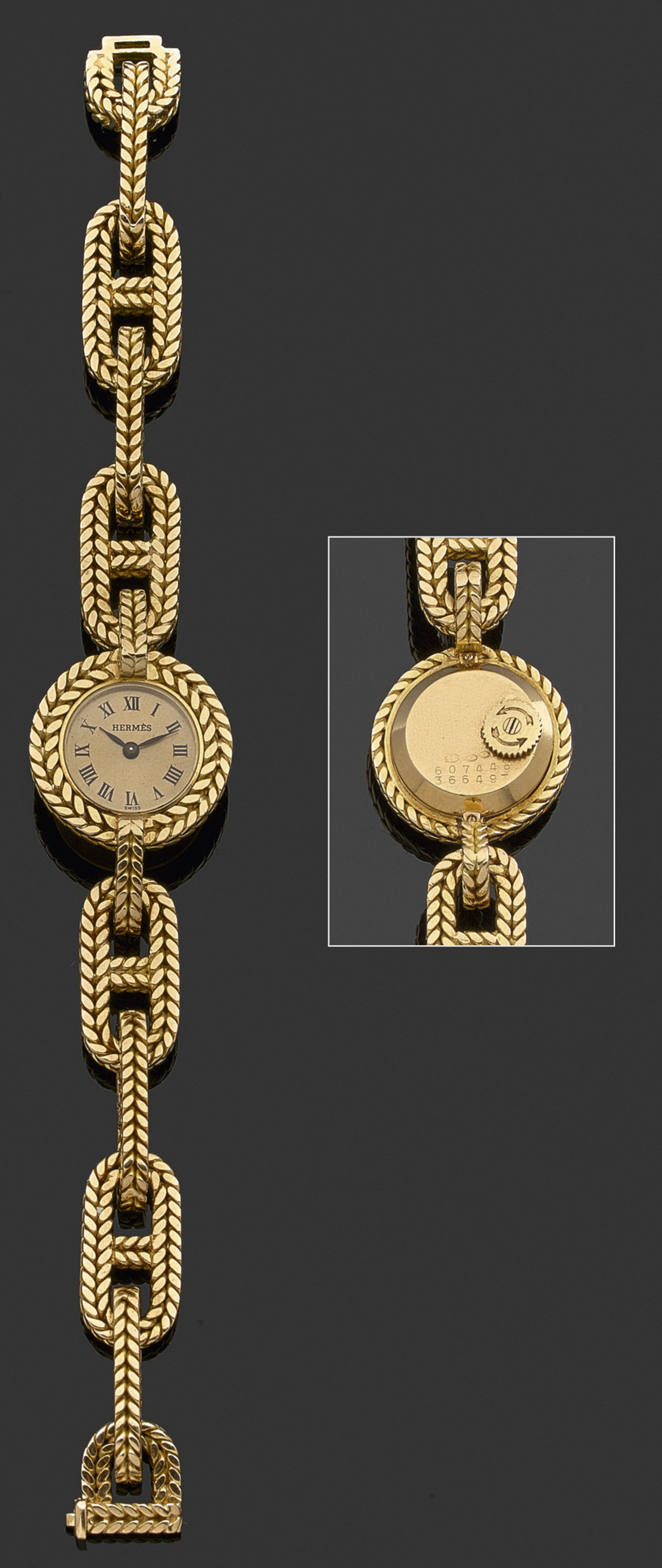 HERMÈSMontre bracelet de dame avec boîtier rond en or jaune tressé. Cadran doré avec index