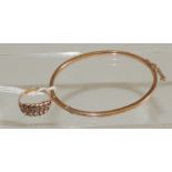 A 9ct gold hollow bangle (A/F) and a 9ct gold knot design ring, size O, (2) 8.2g approx.