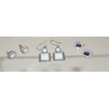 A pair of 9ct gold stud earrings, set with central Cabouchon opal with a surround of clear stones,