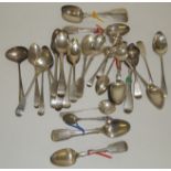 An assortment of silver tea spoons, mostly pairs and singles, a sterling and enamel souvenir spoon -