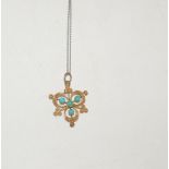 A late Victorian 15ct gold pendant piece of three leaf clover design, set with four Cabouchon