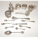 A silver three piece cruet set, hallmarked for Chester 1911, A/F, a silver salt and mustard pot,