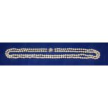 A good quality, cultured pearl double necklace, with 14ct gold clasp. Insurance valuation and full