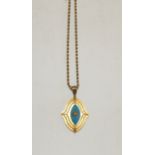 A Victorian gold pendant/locket of oval shaped with stepped design leading up to a Navette shaped