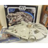 Star Wars - a Hasbro Millennium Falcon in original box together with a Star Wars Rescue on
