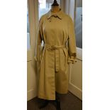 A ladies Dannimac full length coat with belt together with a ladies fur coat (2)