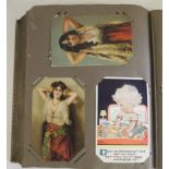 An album of approx. 260 assorted postcards including photo topo; sentimental greetings; artist