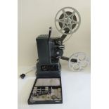 A Paillard Bolex G9.5mm/16mm projector, set up for 16mm, complete with 9.5mm conversion parts,
