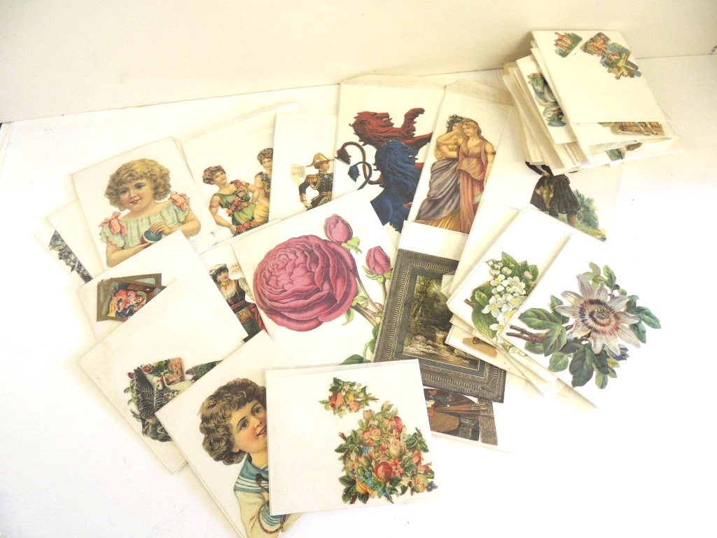 A quantity of Victorian and Edwardian chromo litho scraps, sorted into small card backed wallets,