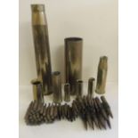 A quantity of brass shell cases and some lengths of brass bullet casings (a lot)