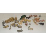 BRITAINS - a small collection of painted lead farm animals and figures including a girl kneeling
