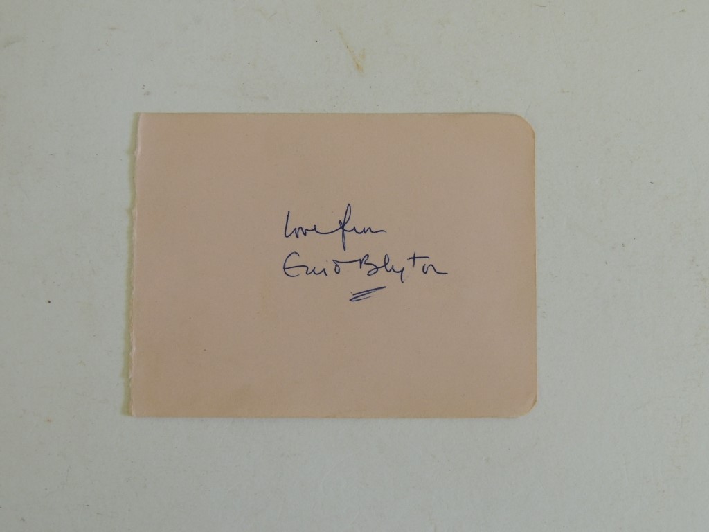 ENID BLYTON - an autograph "Love from Enid Blyton" on a page from an autograph book together with