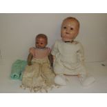 A German made all composition baby doll marked 2054 - HW - 6x "Jubilee" foreign reg design having