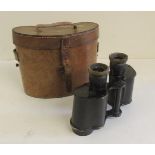 A pair of Ross binoculars in original brown leather case
