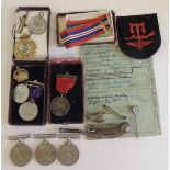 A Defence medal; two WWII war medals; a bosun's whistle; Royal Navy badge; WRNS sweetheart badge;